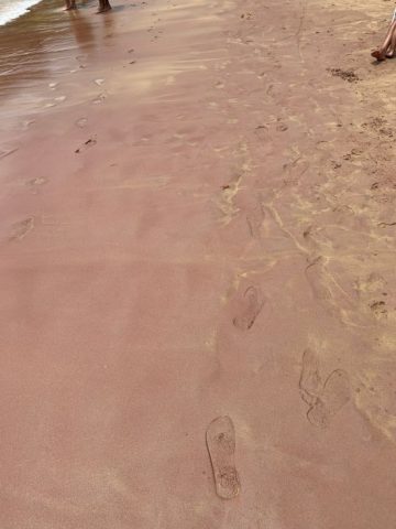 Red sand of Buzios Beach near Rio de Janeiro