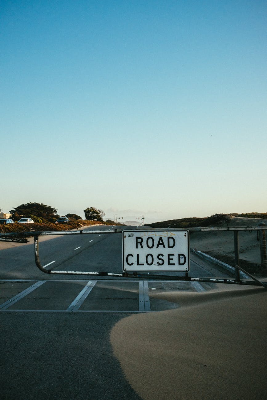 road closed signage - detours to take during solo road trips