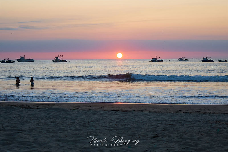 Sunset at the beach in Puerto Lopez Ecuador -- Nicole Buzzing for Wanderful
