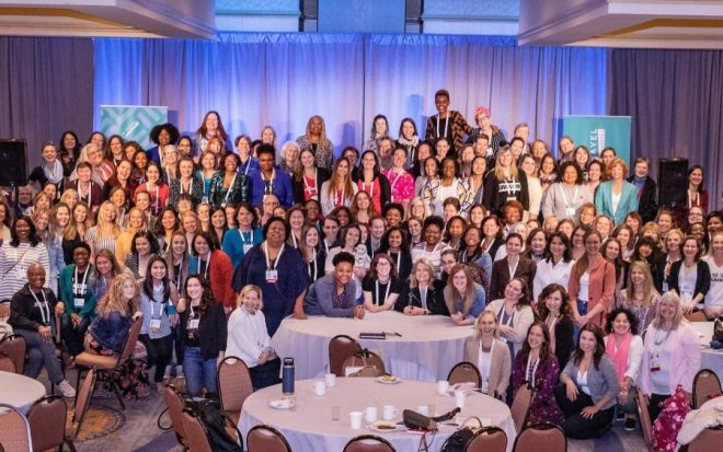 Women in Travel Summit by Wanderful - group photo on stage in Portland Maine 2019