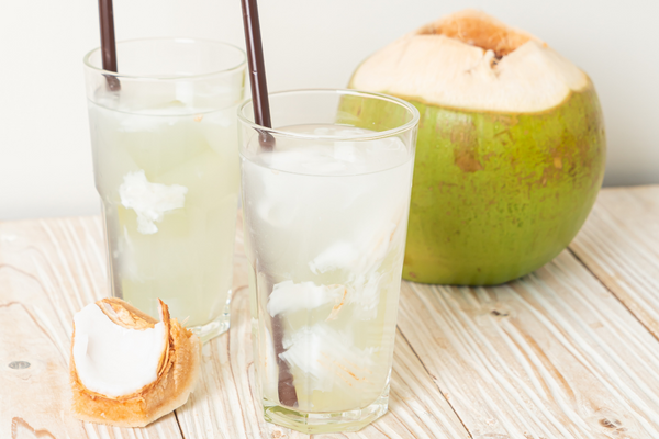 32 Hydrating and Healthy Homemade Coconut Water Recipes | What is coconut water and what are electrolytes? In this post, we will dive into the health benefits of this drink and what unhealthy drinks coconut water can replace. We'll talk about how to make your own coconut water and we'll give you 32 coconut water recipes to try! From smoothies, sparkling cocktails, and infused coconut water drinks, these recipes will bring you so many different ways to reap the health benefits of coconut water!