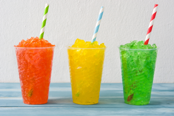 How to Make Slushies at Home: 13 Slurpee Recipes to Try This Summer | Slurpees are an iconic summer treat for kids and adults alike, and they are incredibly easy to make! In this post, we'll teach you how to make homemade slushies, including what kitchen tools you need, tips for making healthier slushy syrup recipes and we've also included a list of our favorite homemade DIY slushie recipes you can make in mere minutes to help your kids cool down on a hot summer's day!