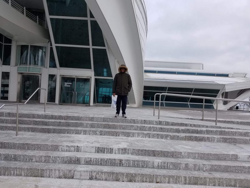 Standing atop the steps at the Milwaukee Art Museum